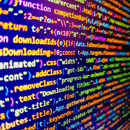 Close-up of colorful code on a computer screen